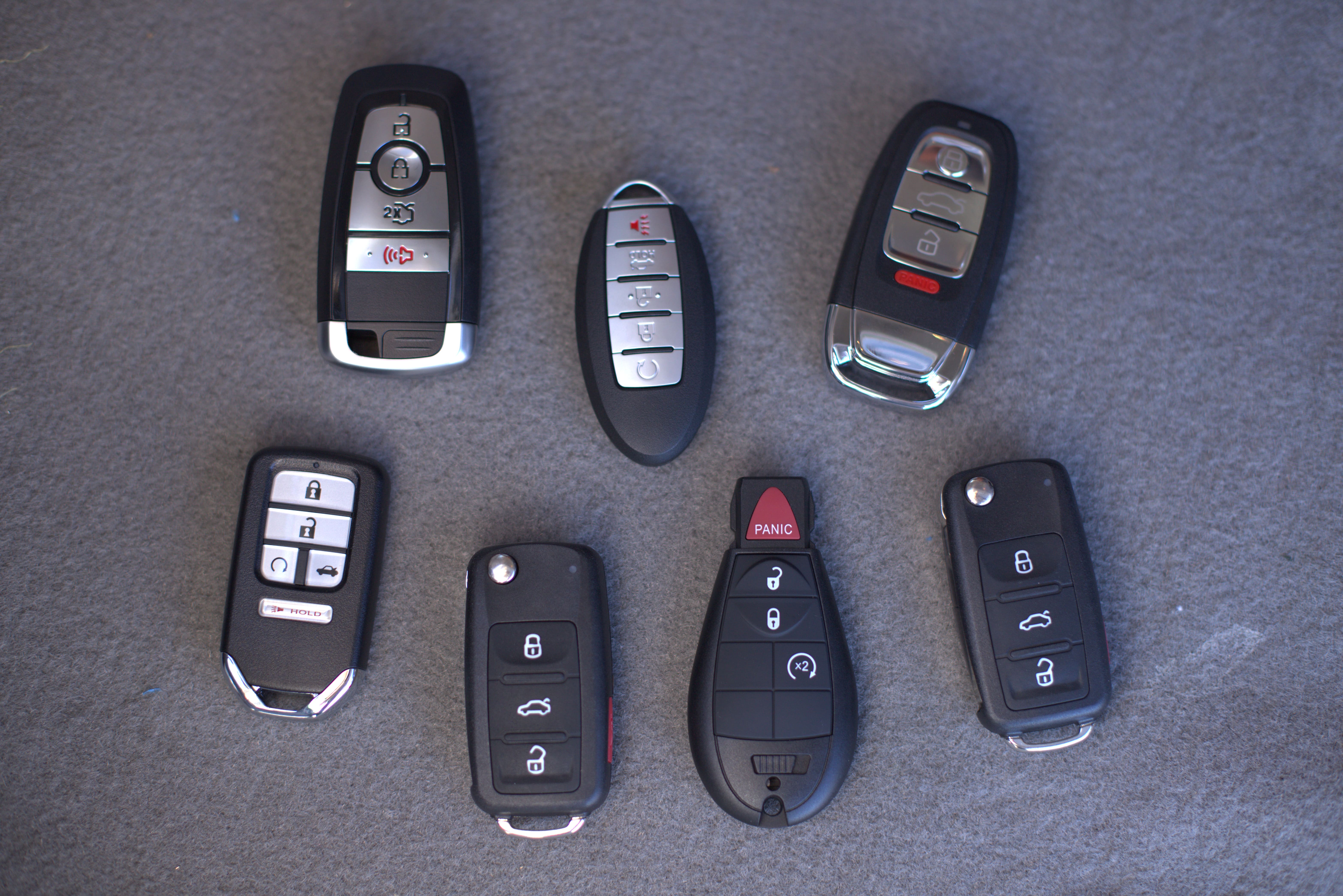 Key fobs for multiple vehicles displayed